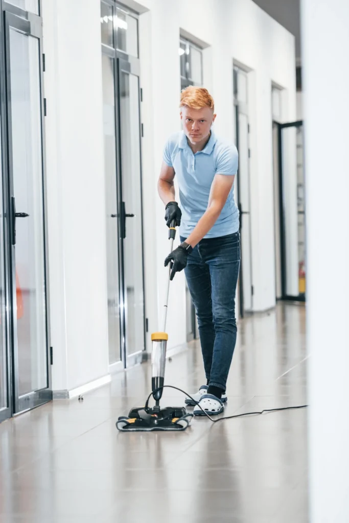 Commercial cleaner providing hard floor cleaning in a modern office facility